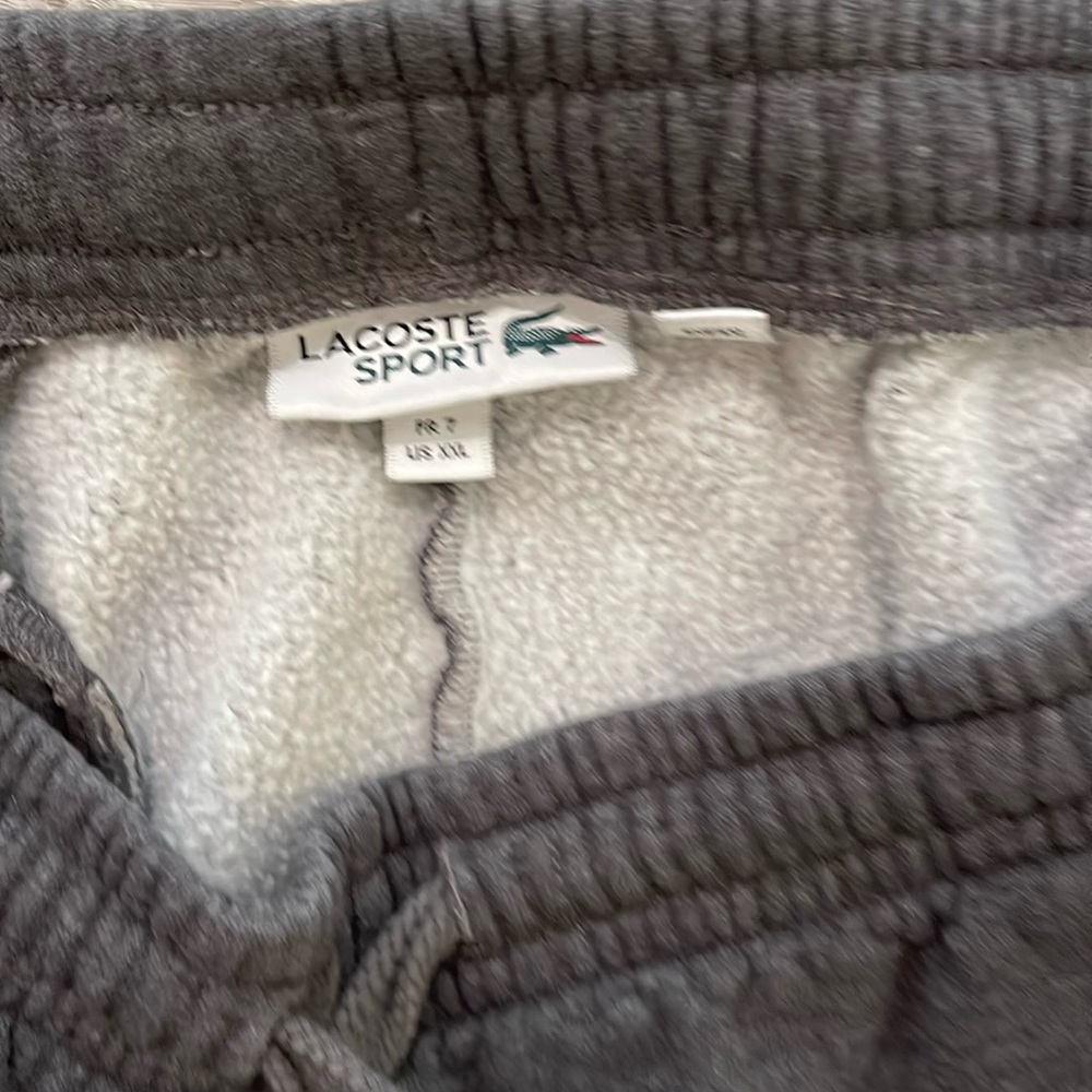 Men’s gray Lacoste cotton tennis shorts. Size XXL but wears like an L.
